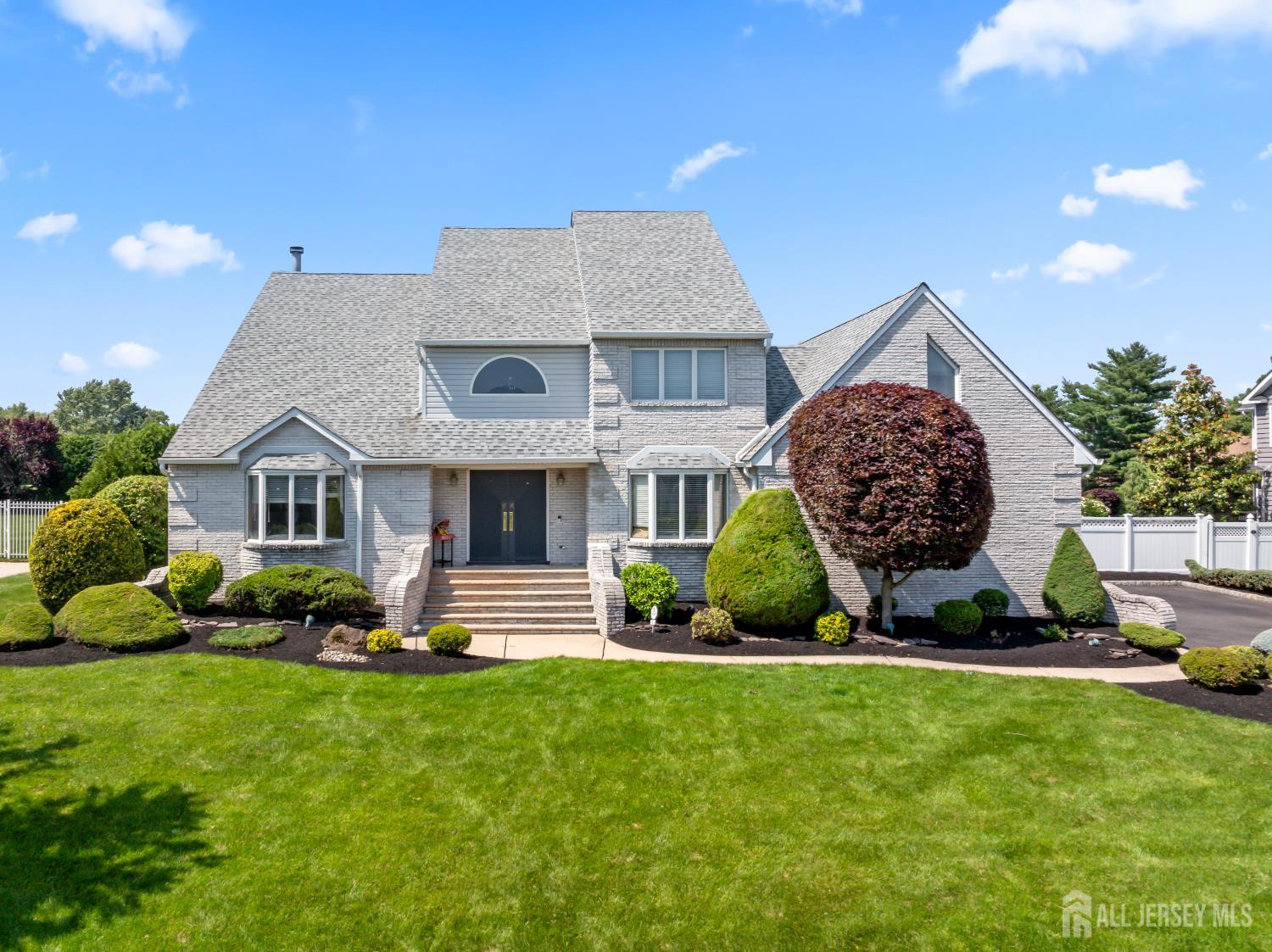 6 Allison Court Edison, NJ 08820 - Photo 53 of 53 a front view of a house with a yard