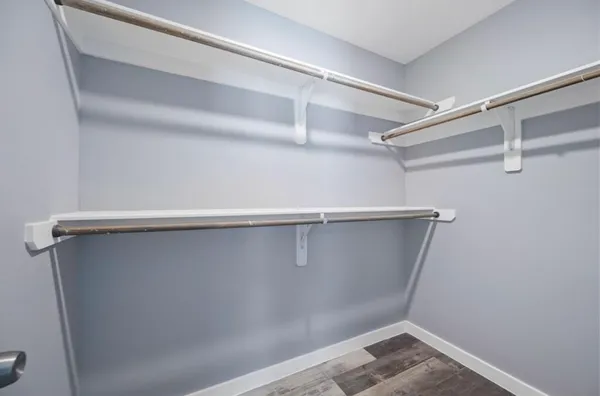 a view of an empty walk in closet
