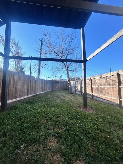 622 Maple Way Houston, TX 77015 - Photo 22 of 23 a view of backyard with wooden fence