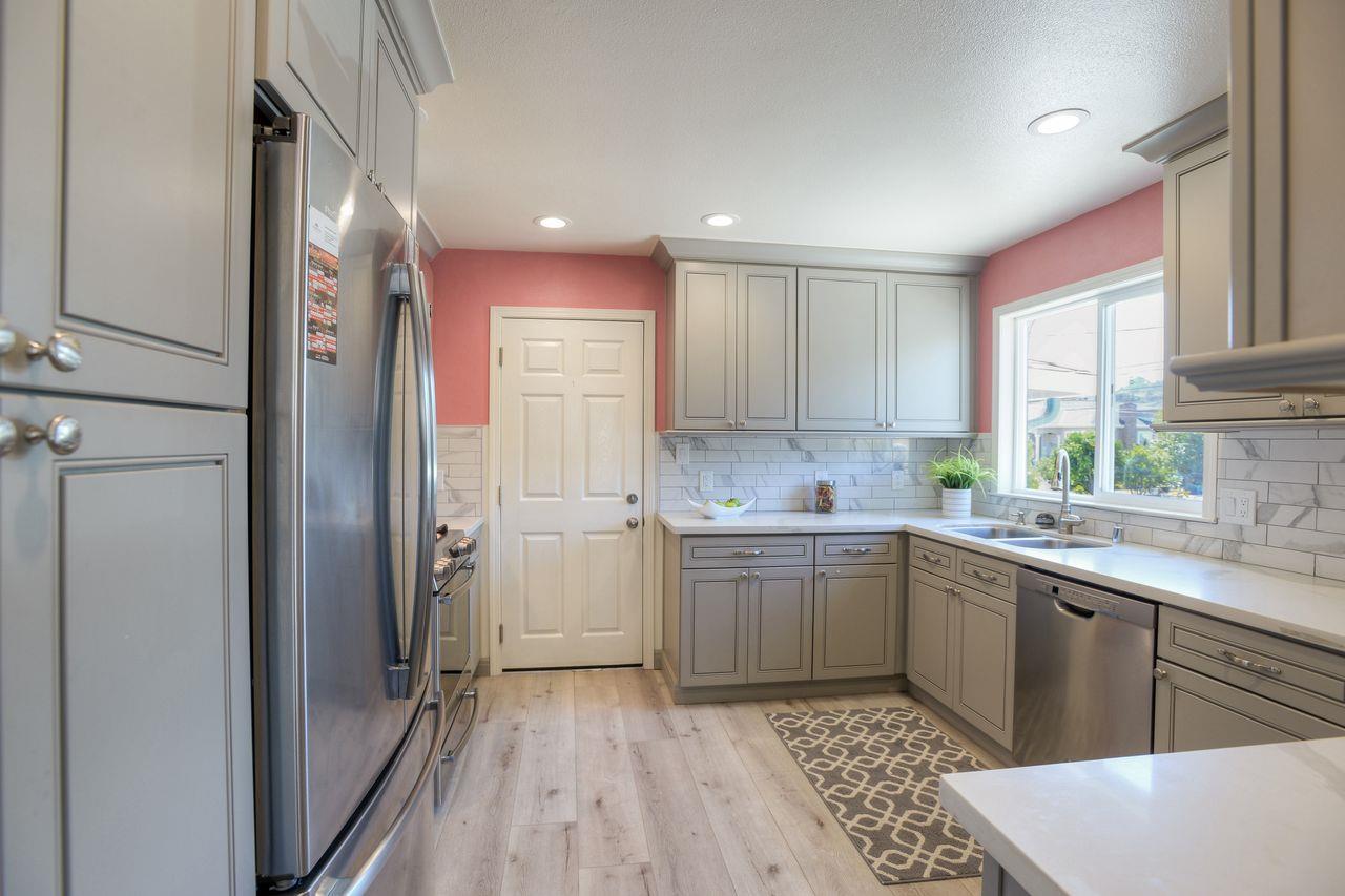 15 Robert Place Millbrae, CA 94030 - Photo 11 of 30 a kitchen with a sink and refrigerator