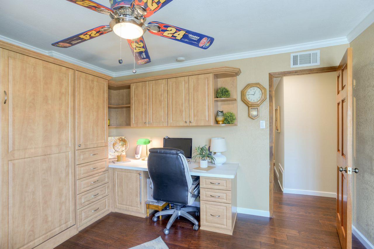 15 Robert Place Millbrae, CA 94030 - Photo 17 of 30 a view of a workspace with furniture and a window