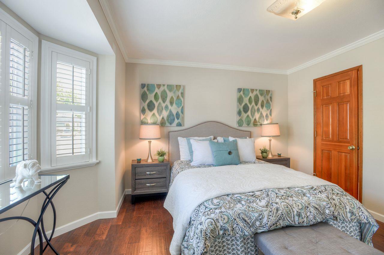 15 Robert Place Millbrae, CA 94030 - Photo 19 of 30 a bedroom with a bed and a window