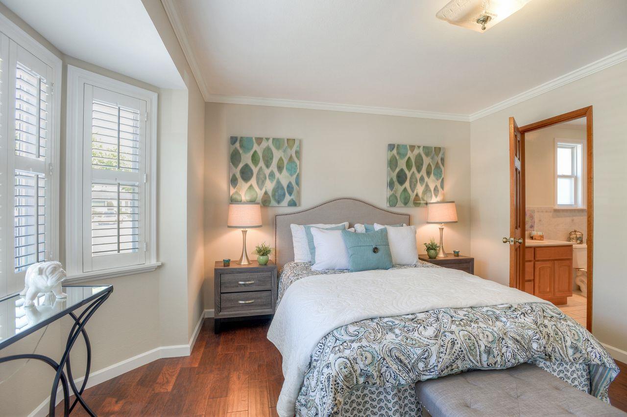 15 Robert Place Millbrae, CA 94030 - Photo 20 of 30 a bedroom with a large bed and a window