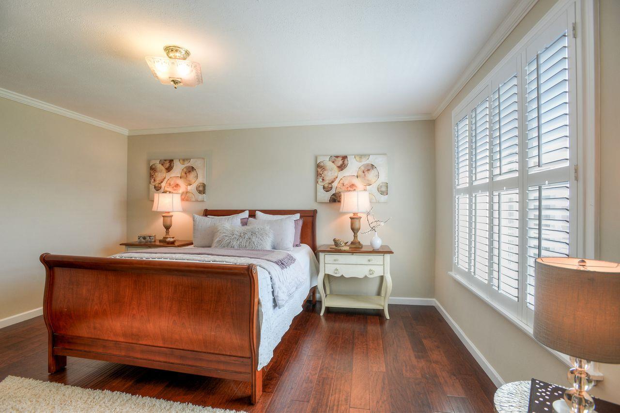 15 Robert Place Millbrae, CA 94030 - Photo 21 of 30 a bedroom with a bed and a window