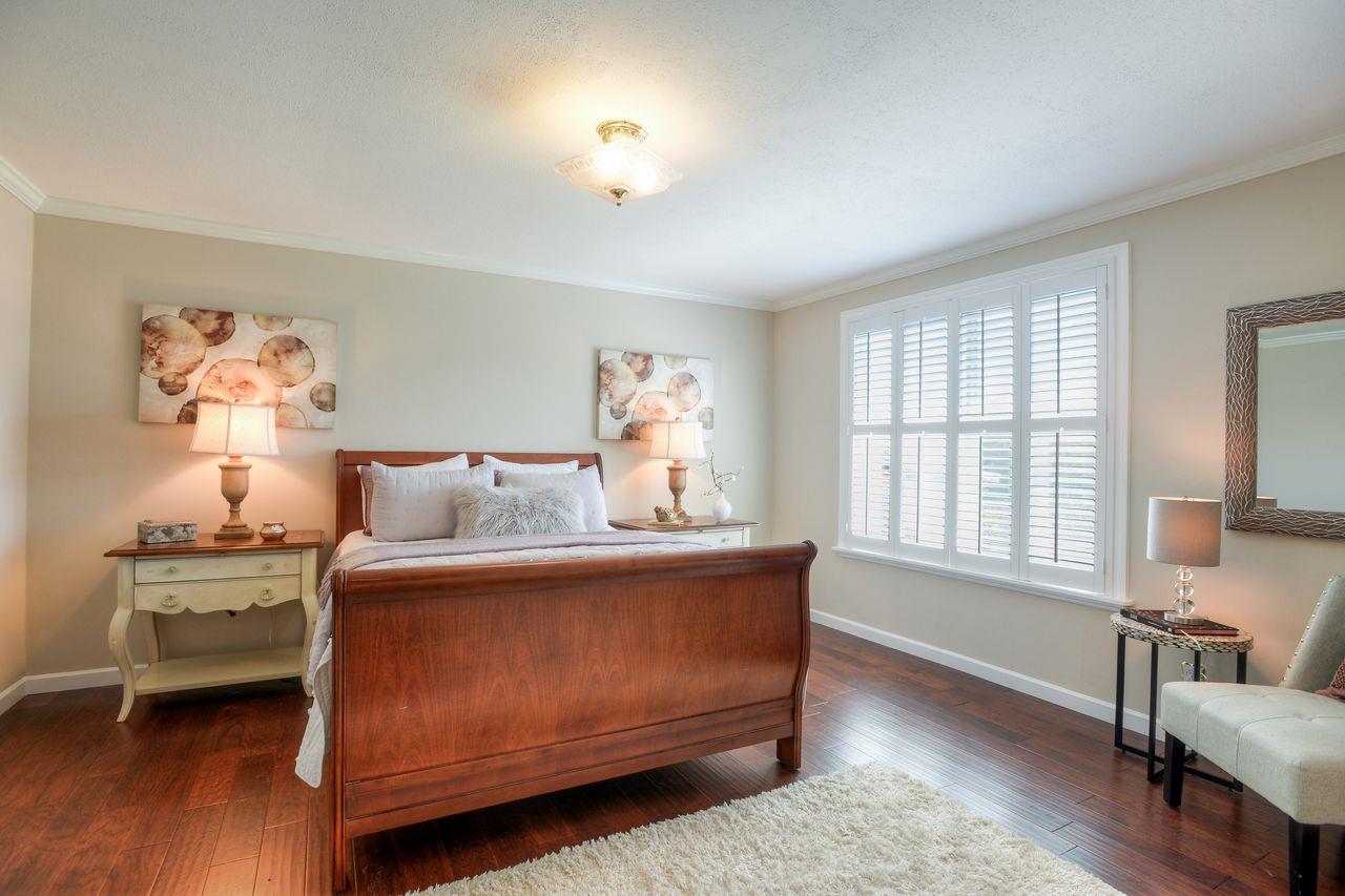15 Robert Place Millbrae, CA 94030 - Photo 22 of 30 a living room with furniture and wooden floor