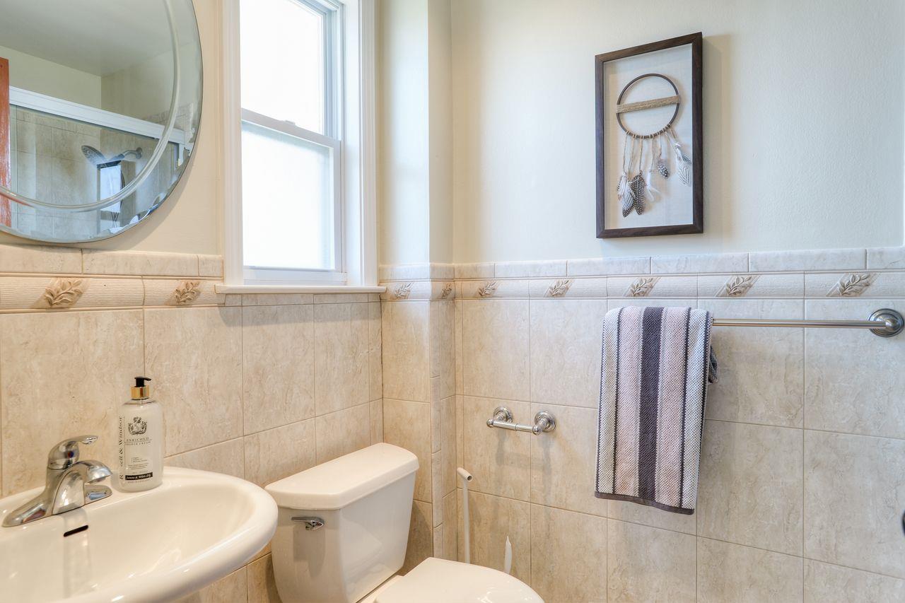 15 Robert Place Millbrae, CA 94030 - Photo 24 of 30 a bathroom with a toilet sink and mirror