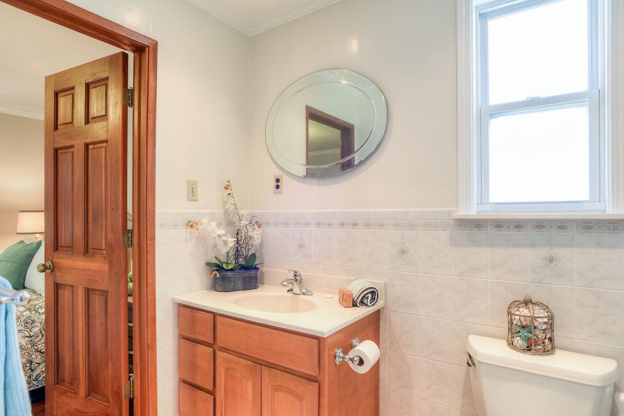 15 Robert Place Millbrae, CA 94030 - Photo 26 of 30 a bathroom with a sink and a mirror