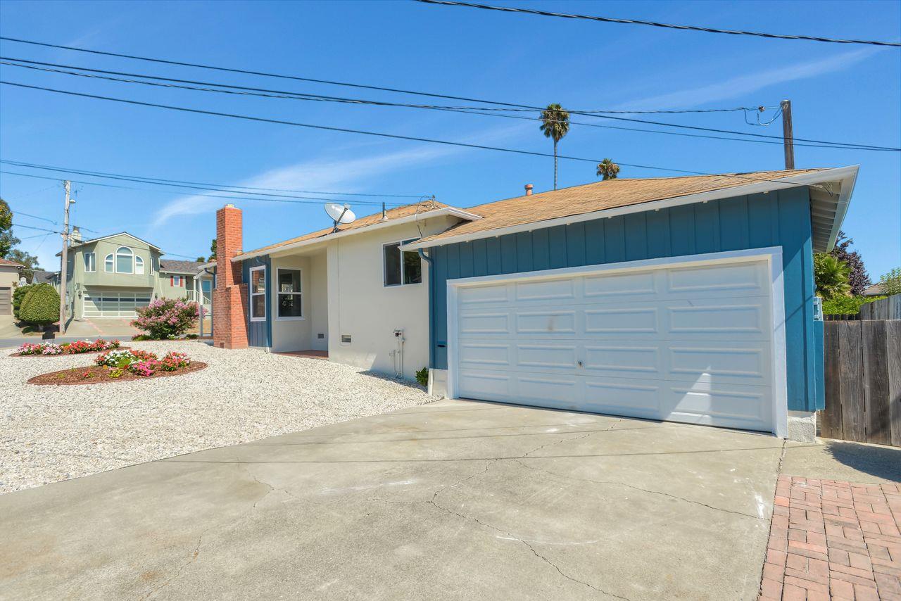 15 Robert Place Millbrae, CA 94030 - Photo 4 of 30 a front view of a house with a garage