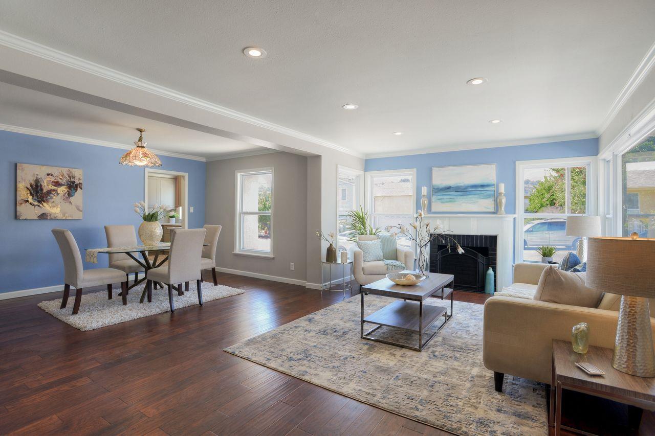 15 Robert Place Millbrae, CA 94030 - Photo 5 of 30 a living room with furniture a fireplace and a table