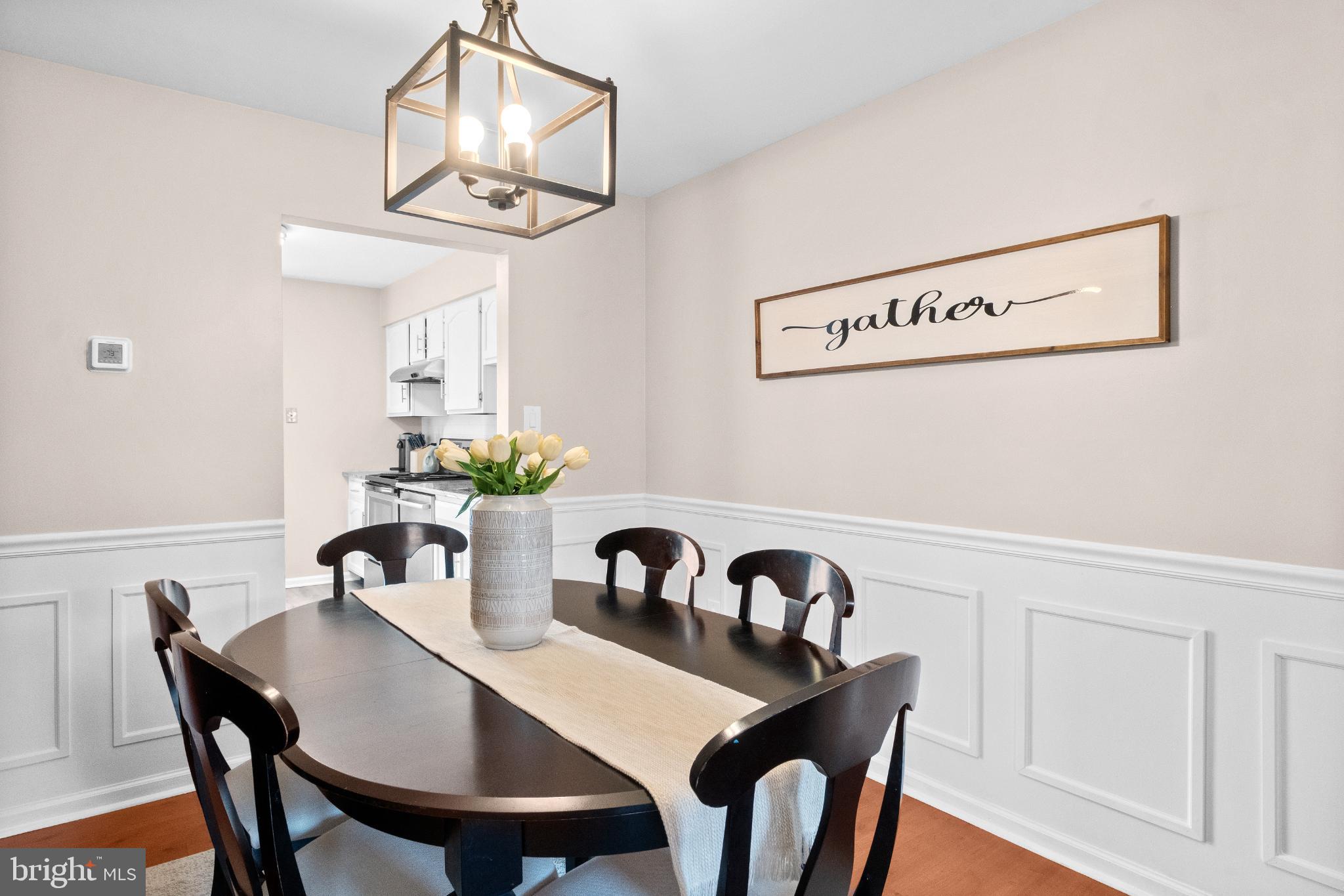 210 Martins Way Mount Laurel, NJ 08054 - Photo 16 of 38 a view of a dining room that has a table and chairs