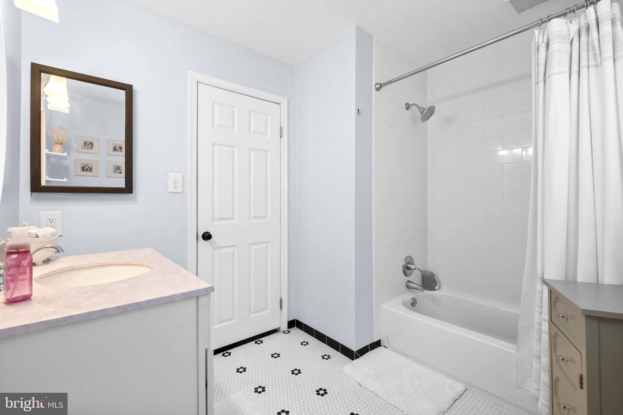 210 Martins Way Mount Laurel, NJ 08054 - Photo 23 of 38 a bathroom with a bathtub a shower and a sink