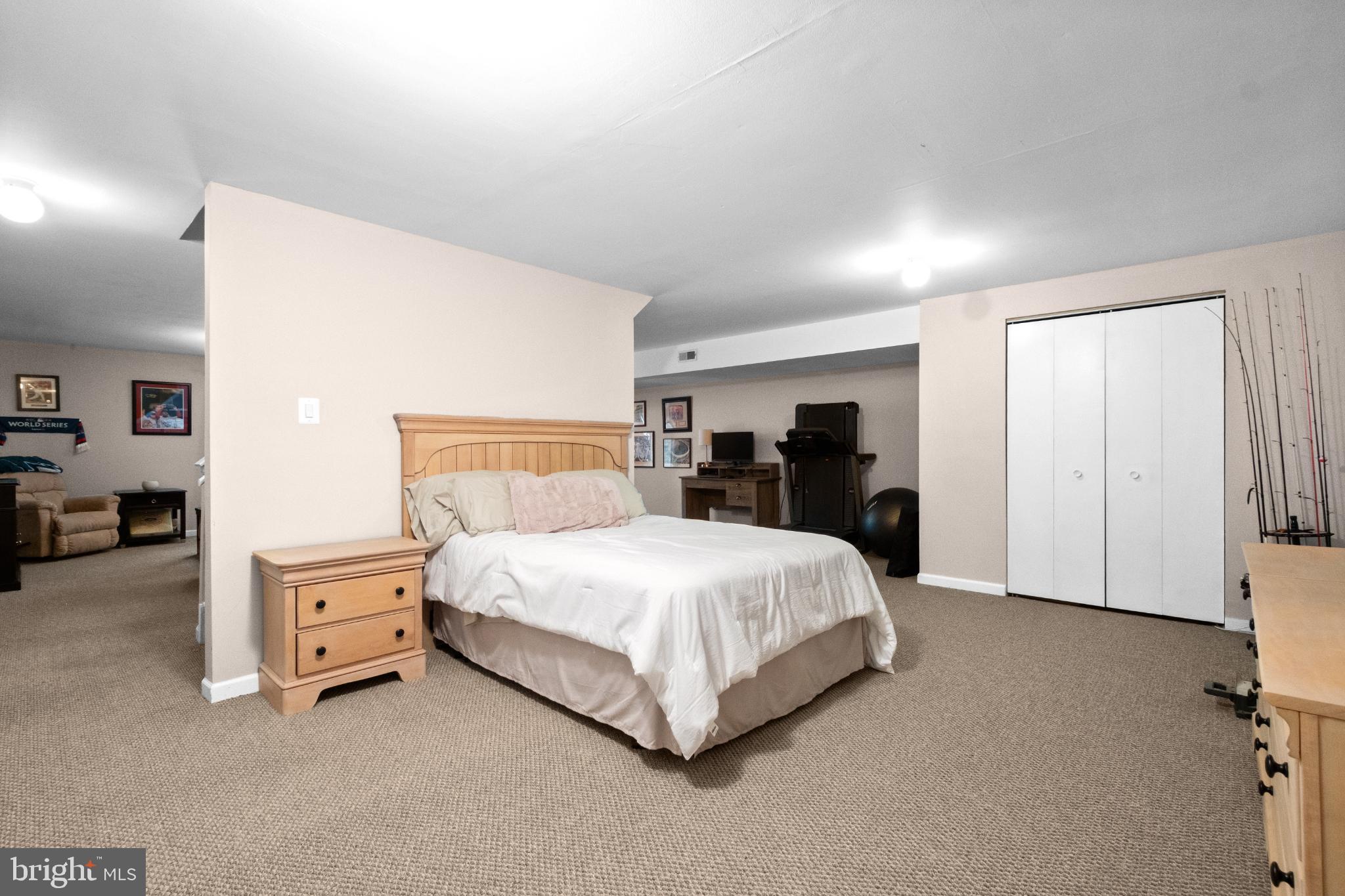 210 Martins Way Mount Laurel, NJ 08054 - Photo 34 of 38 a bedroom with a bed and a night stand