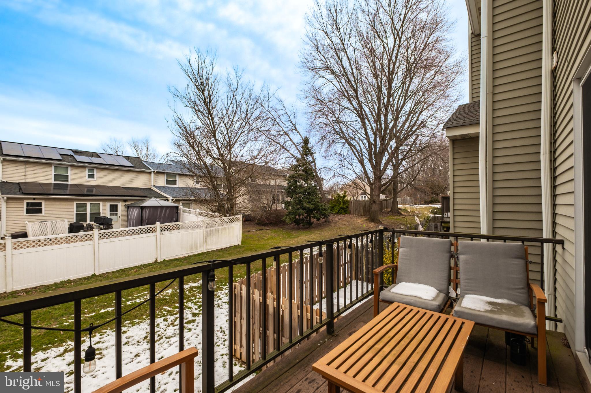 210 Martins Way Mount Laurel, NJ 08054 - Photo 9 of 38 a view of balcony with wooden floor and fence