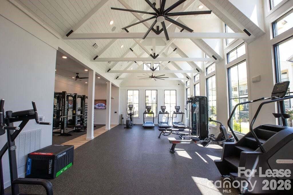 102 Kennedy Rdg Way, Unit ALEXANDER Mooresville, NC 28115 - Photo 13 of 37 a view of a room with gym equipment