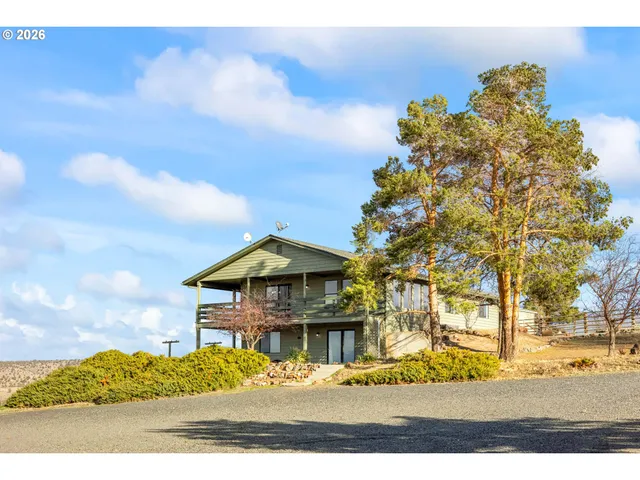 a view of house with outdoor space