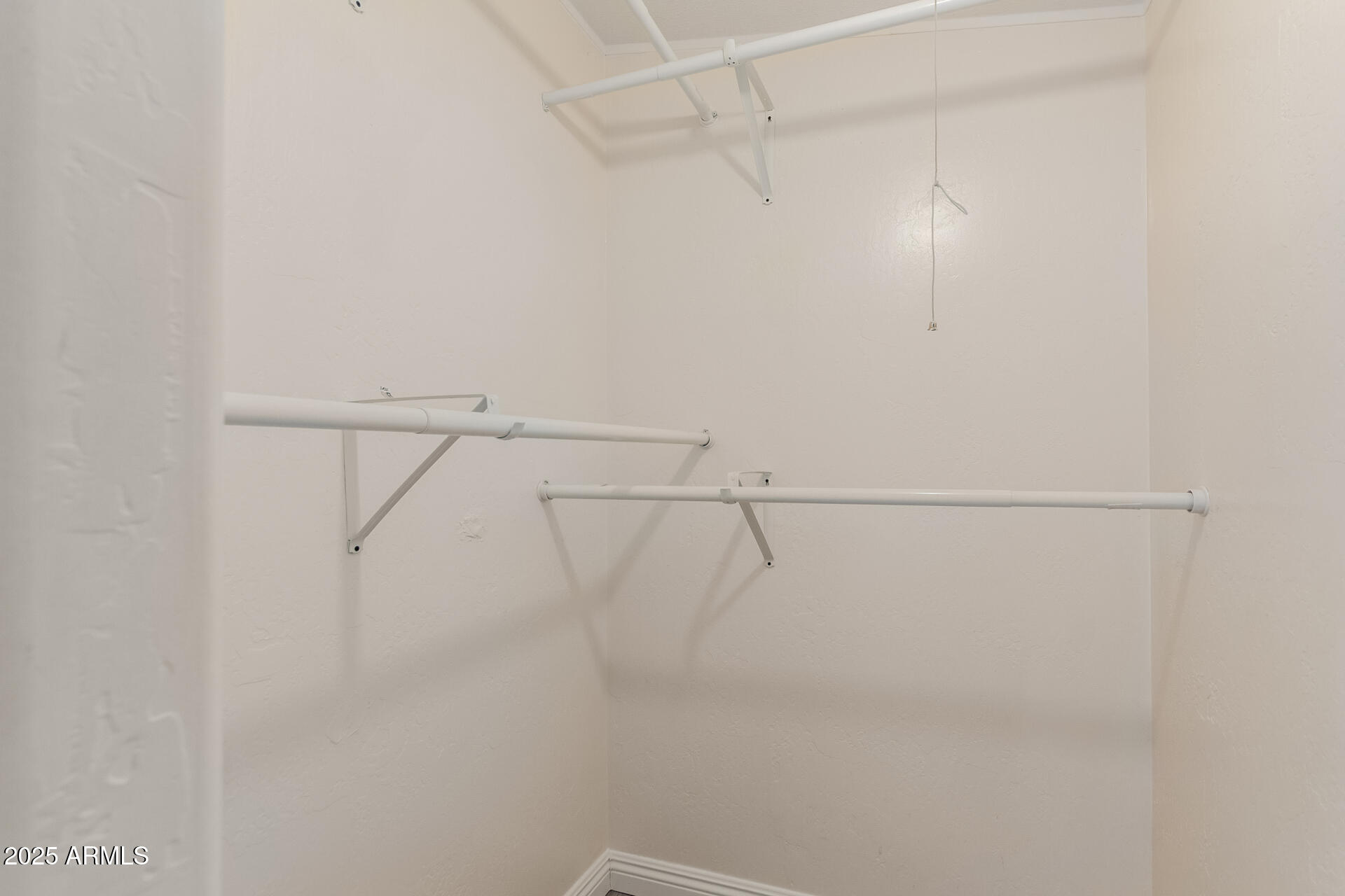 2000 South Apache Road, Unit 276 Buckeye, AZ 85326 - Photo 15 of 27 a view of a room with racks on the wall