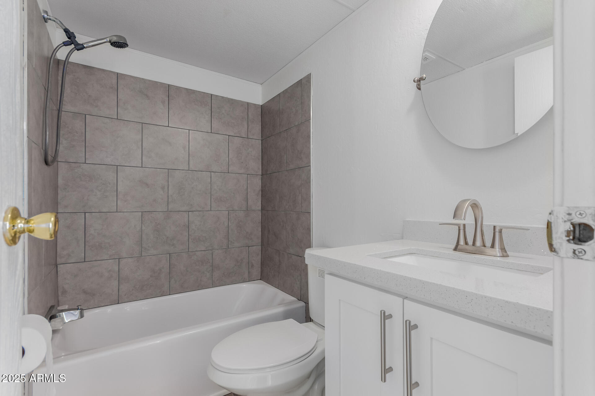 2000 South Apache Road, Unit 276 Buckeye, AZ 85326 - Photo 19 of 27 a bathroom with a sink a toilet and shower