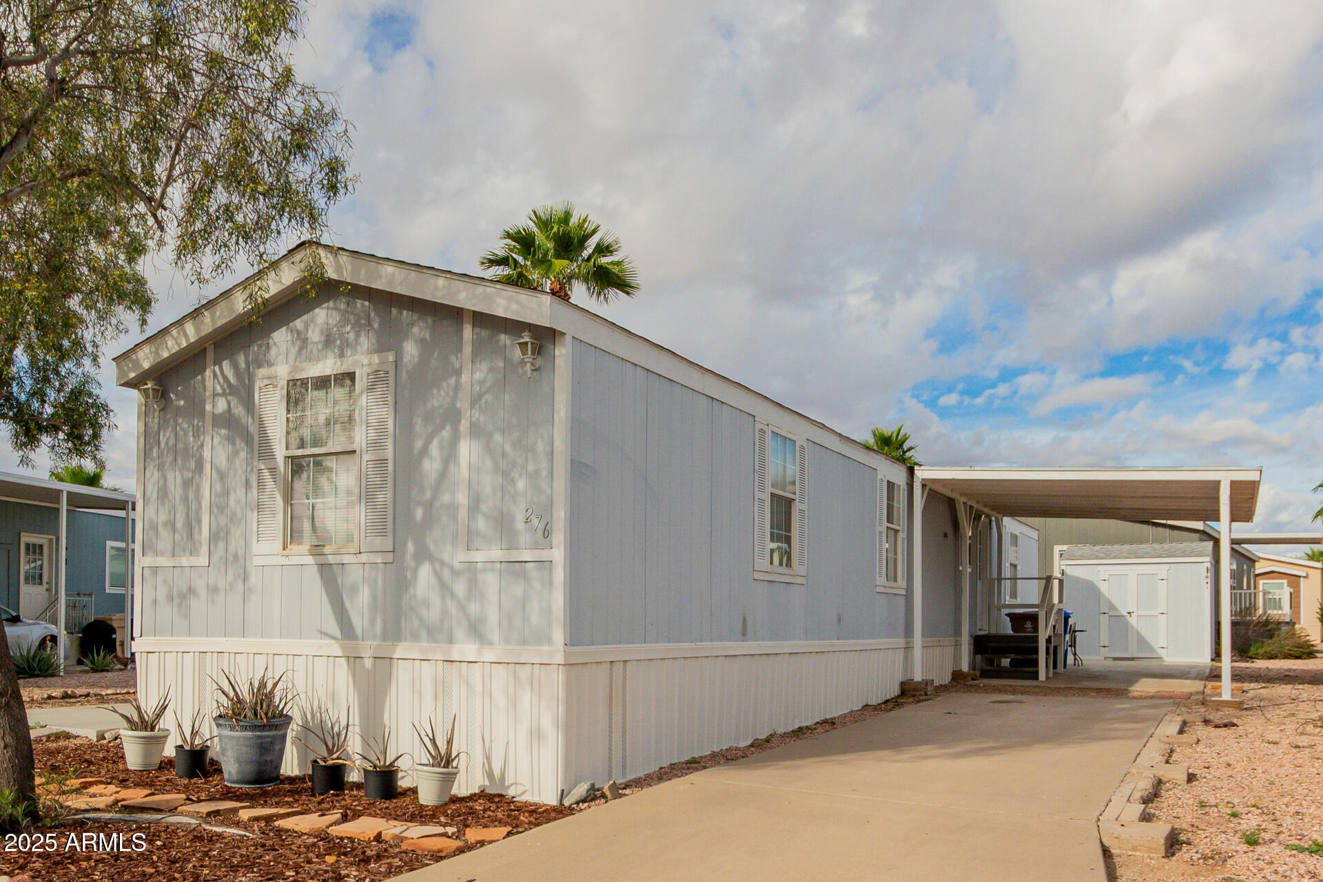 2000 South Apache Road, Unit 276 Buckeye, AZ 85326 - Photo 2 of 27 a front view of a house