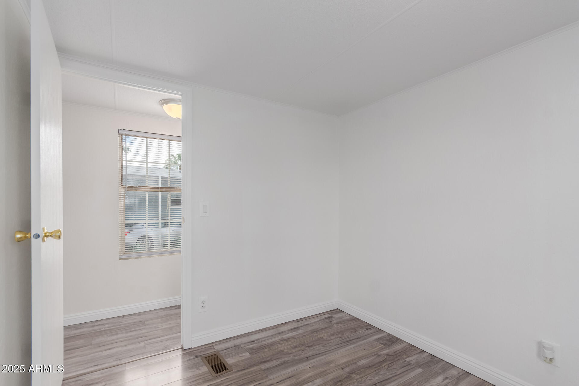 2000 South Apache Road, Unit 276 Buckeye, AZ 85326 - Photo 22 of 27 wooden floor in an empty room