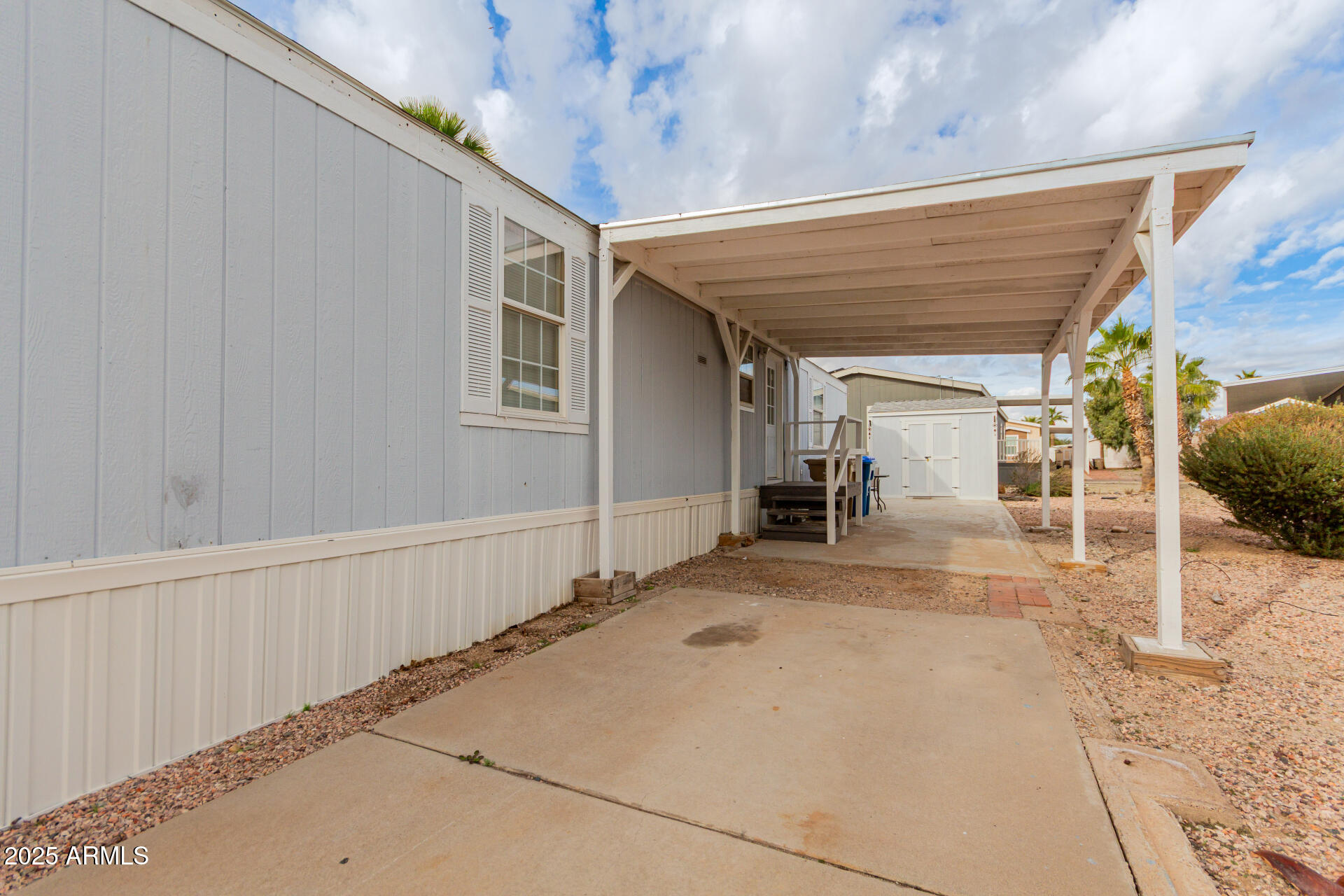 2000 South Apache Road, Unit 276 Buckeye, AZ 85326 - Photo 25 of 27 a view of a porch