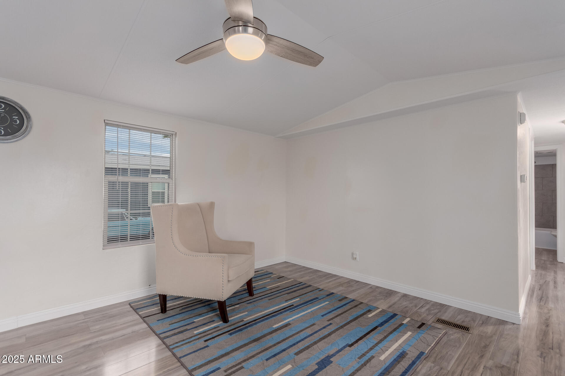 2000 South Apache Road, Unit 276 Buckeye, AZ 85326 - Photo 6 of 27 a living room with furniture and a window
