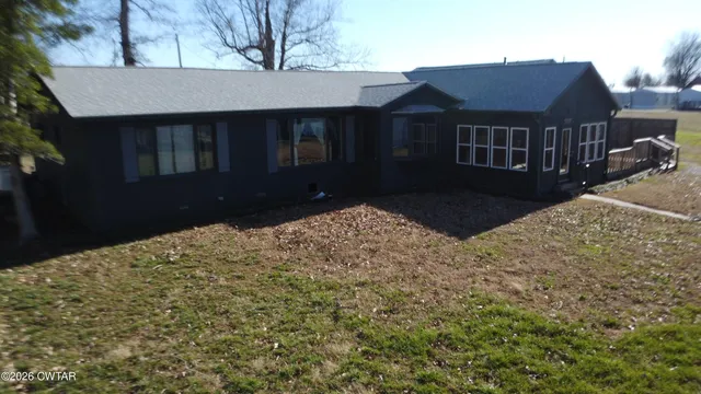 a view of a yard in front of a house