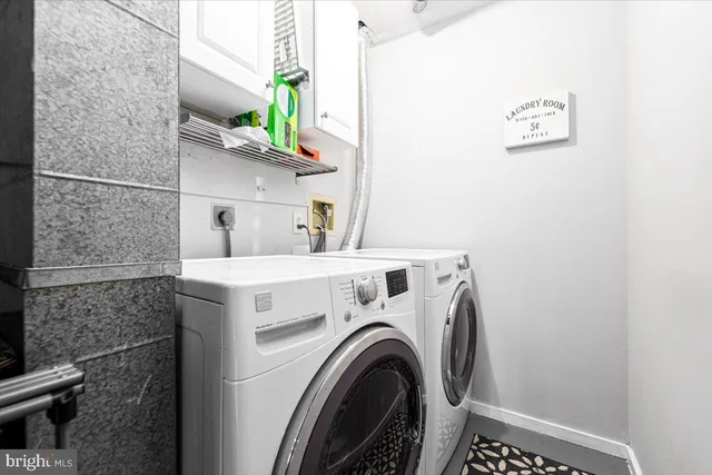 a view of a patio with a dining table and chairs