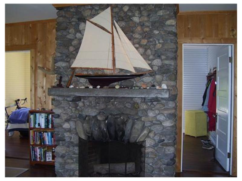 139 Harborside Road Brooksville, ME 04642 - Photo 4 of 22 Living Room. Wonderful fireplace in...