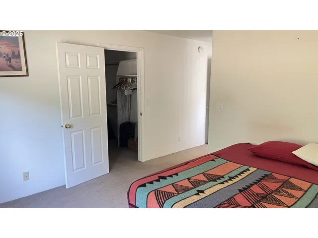 a black and white photo of a living room
