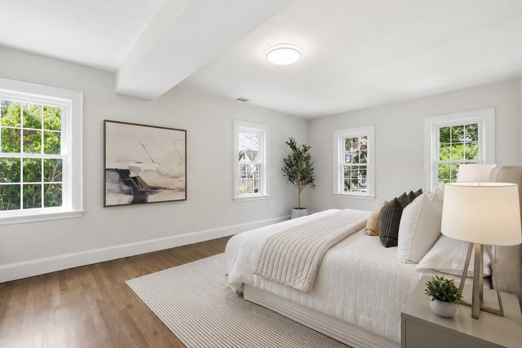 128 Watson Road Belmont, MA 02478 - Photo 33 of 34 a bedroom with a large bed and a window