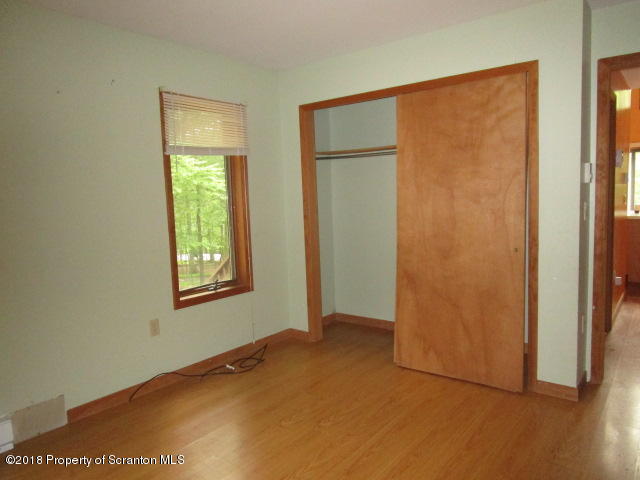 5687 Decker Road Bushkill, PA 18324 - Photo 3 of 8 a view of an empty room with a window