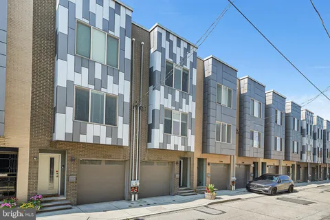 a city street lined with tall buildings