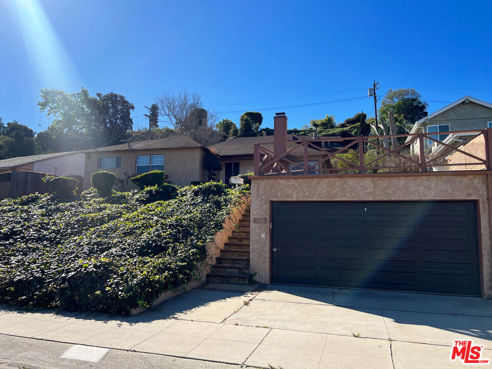5280 Sanchez Drive Los Angeles, CA 90008 - Photo 1 of 30 a view of a house with a garden