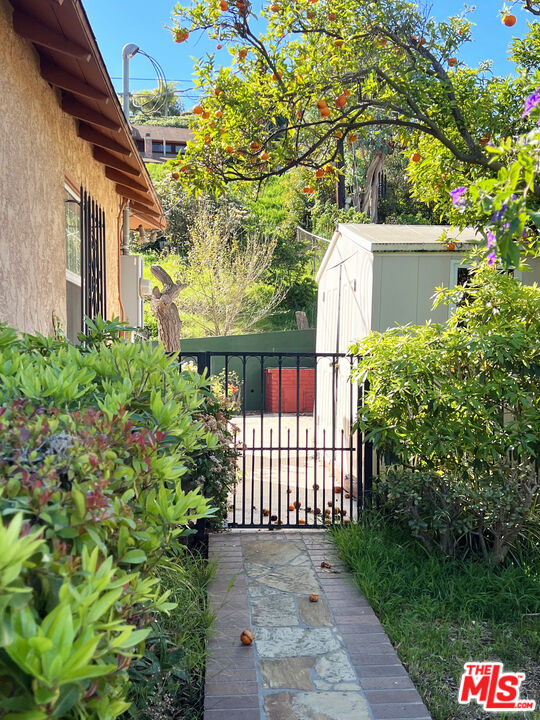5280 Sanchez Drive Los Angeles, CA 90008 - Photo 21 of 30 a view of a house with a flower garden