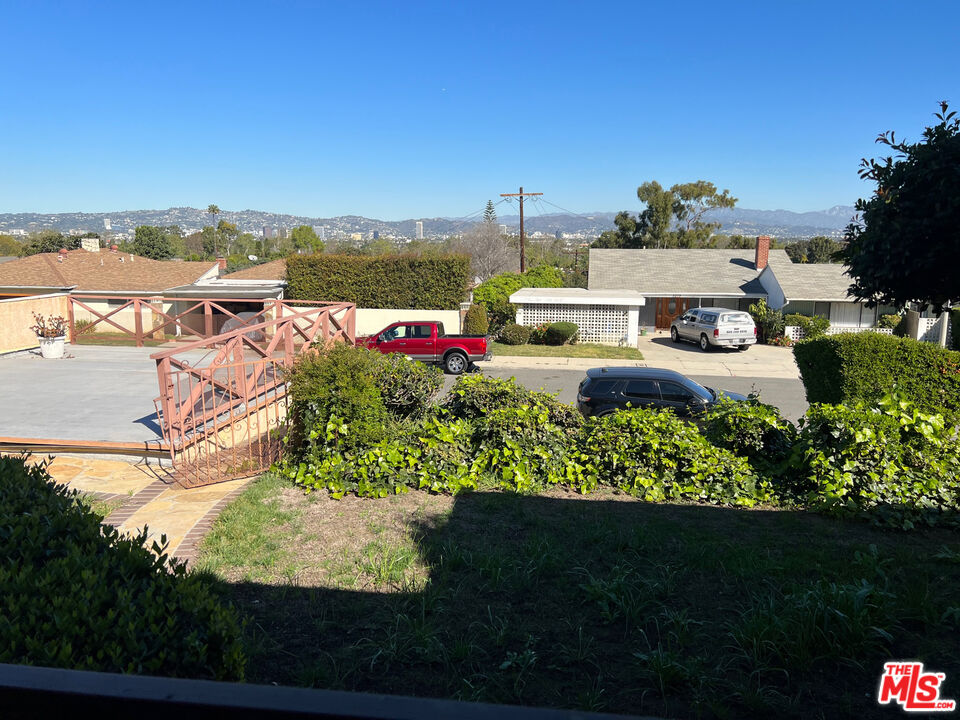 5280 Sanchez Drive Los Angeles, CA 90008 - Photo 26 of 30 a view of a lake with a house