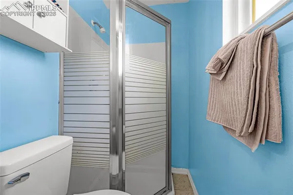 a view of a hallway with washer and dryer