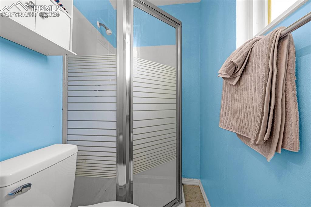7045 Roaring Spring Terrace Fountain, CO 80817 - Photo 17 of 45 a view of a hallway with washer and dryer