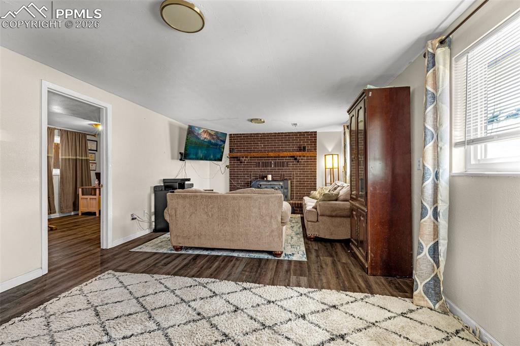 7045 Roaring Spring Terrace Fountain, CO 80817 - Photo 18 of 45 a living room with furniture and a window