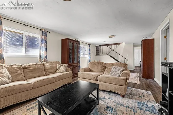 a living room with furniture and a couch