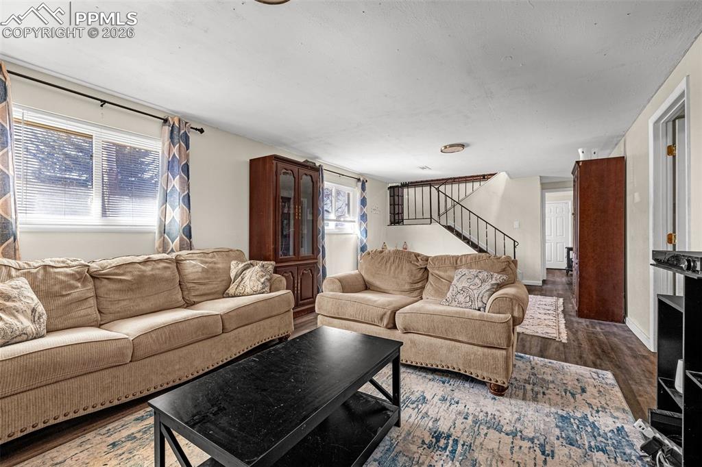 7045 Roaring Spring Terrace Fountain, CO 80817 - Photo 20 of 45 a living room with furniture and a couch