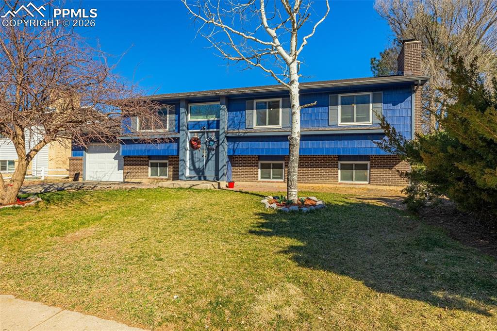 7045 Roaring Spring Terrace Fountain, CO 80817 - Photo 3 of 45 a house view with a swimming pool