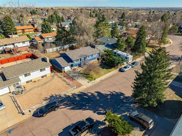 an aerial view of a houses with outdoor space