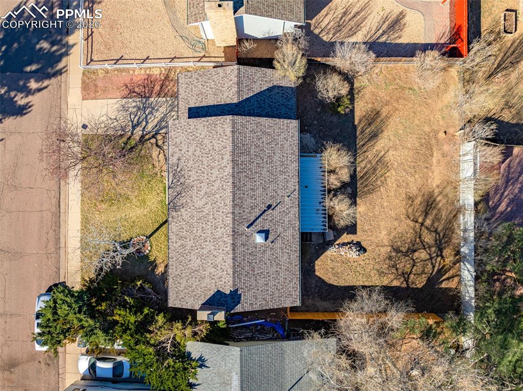 7045 Roaring Spring Terrace Fountain, CO 80817 - Photo 40 of 45 a view of a house with a backyard