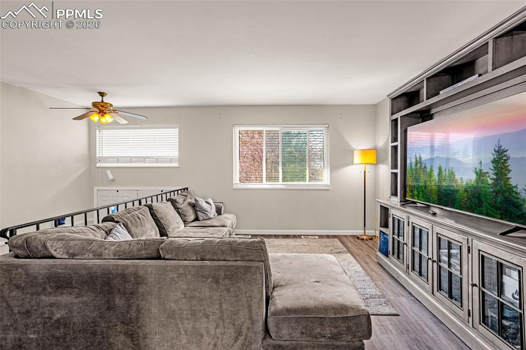 7045 Roaring Spring Terrace Fountain, CO 80817 - Photo 5 of 45 a living room with furniture and a window