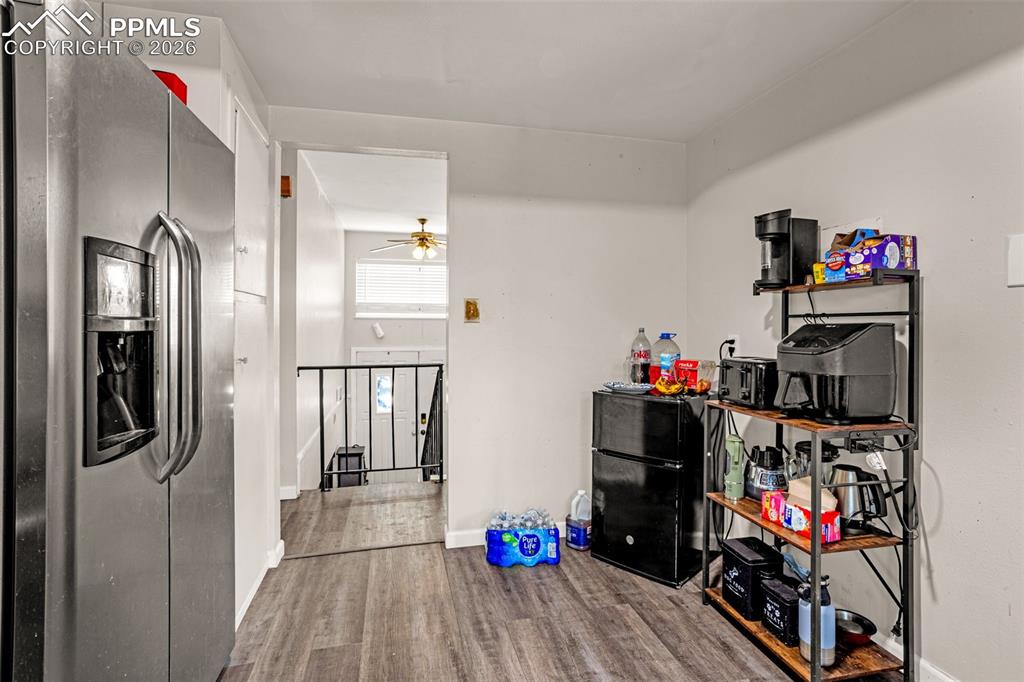 7045 Roaring Spring Terrace Fountain, CO 80817 - Photo 7 of 45 a very nice looking room with wooden floor and a closet