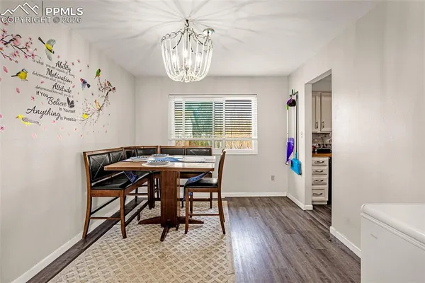 a workspace with furniture and window