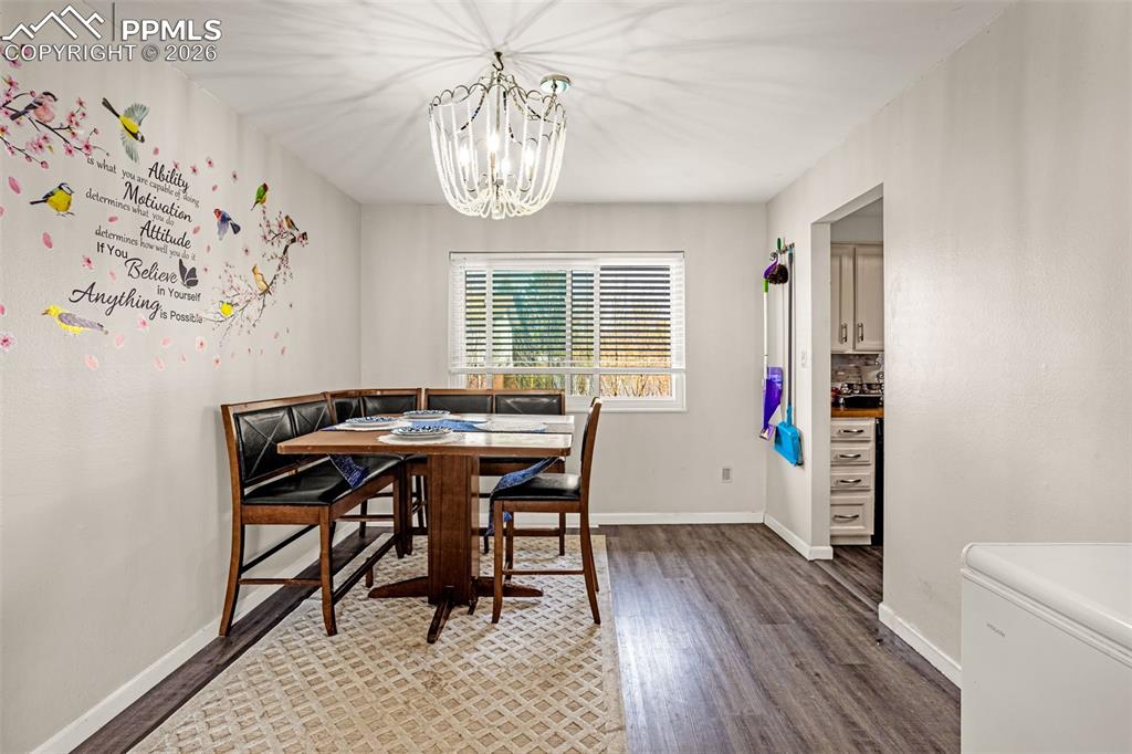 7045 Roaring Spring Terrace Fountain, CO 80817 - Photo 10 of 45 a workspace with furniture and window