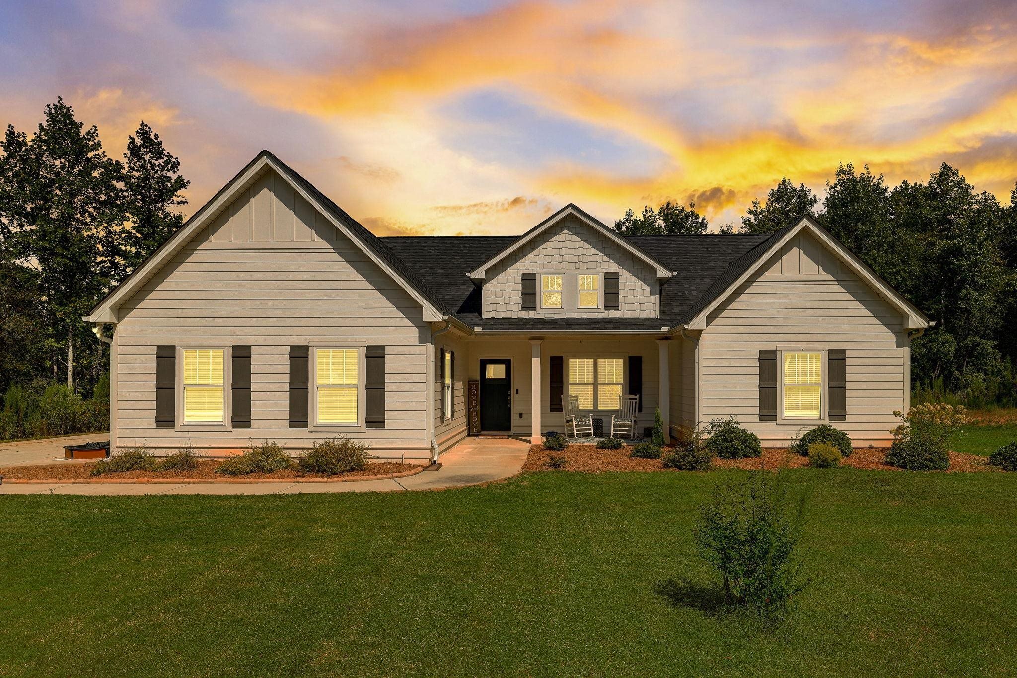 115 Courtland Road Brooks, GA 30205 - Photo 1 of 1 a front view of house with yard and green space