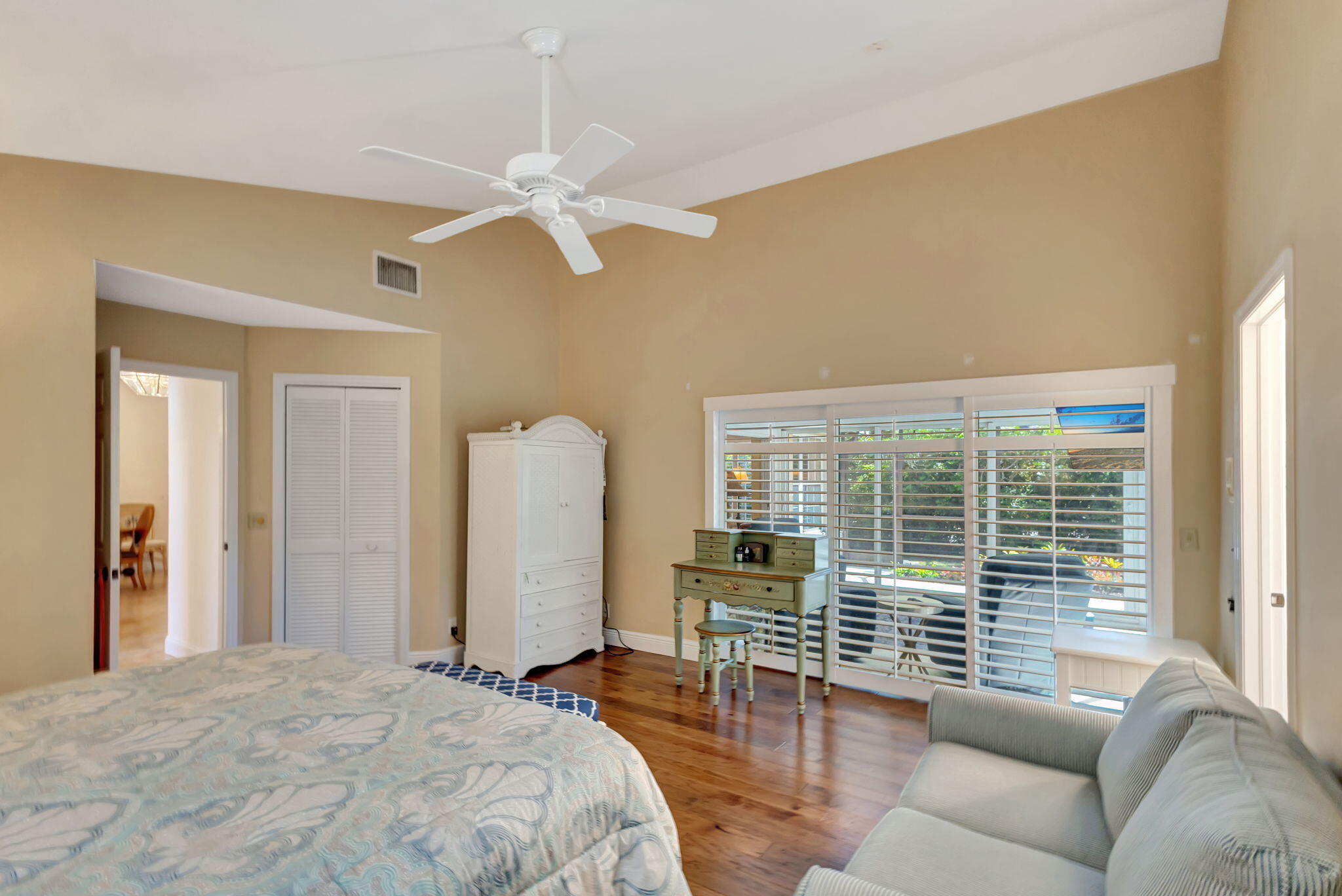 3790 Shearwater Drive Jupiter, FL 33477 - Photo 12 of 30 a bedroom with furniture and a large window