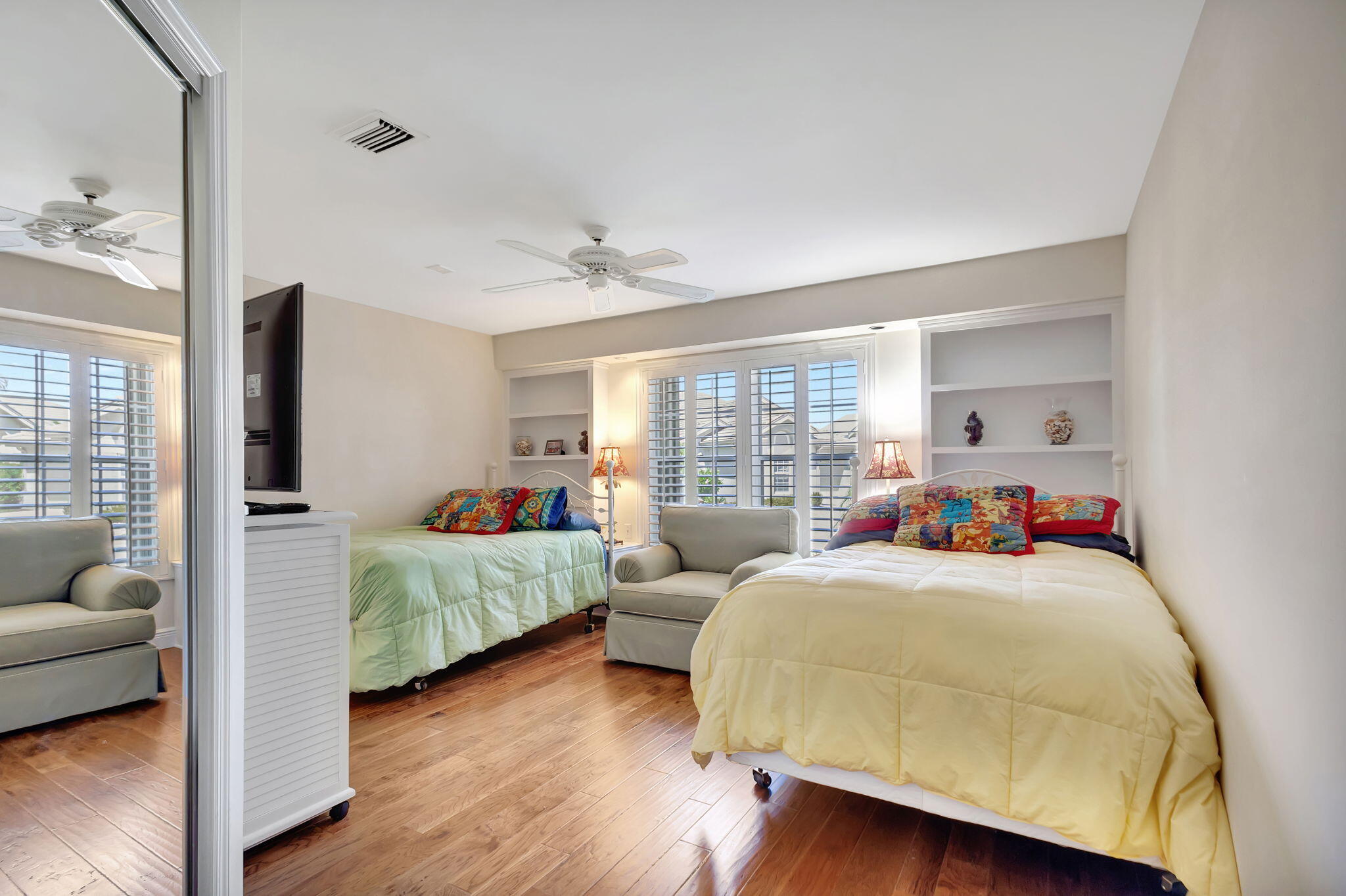 3790 Shearwater Drive Jupiter, FL 33477 - Photo 18 of 30 a bedroom with two beds and a couch